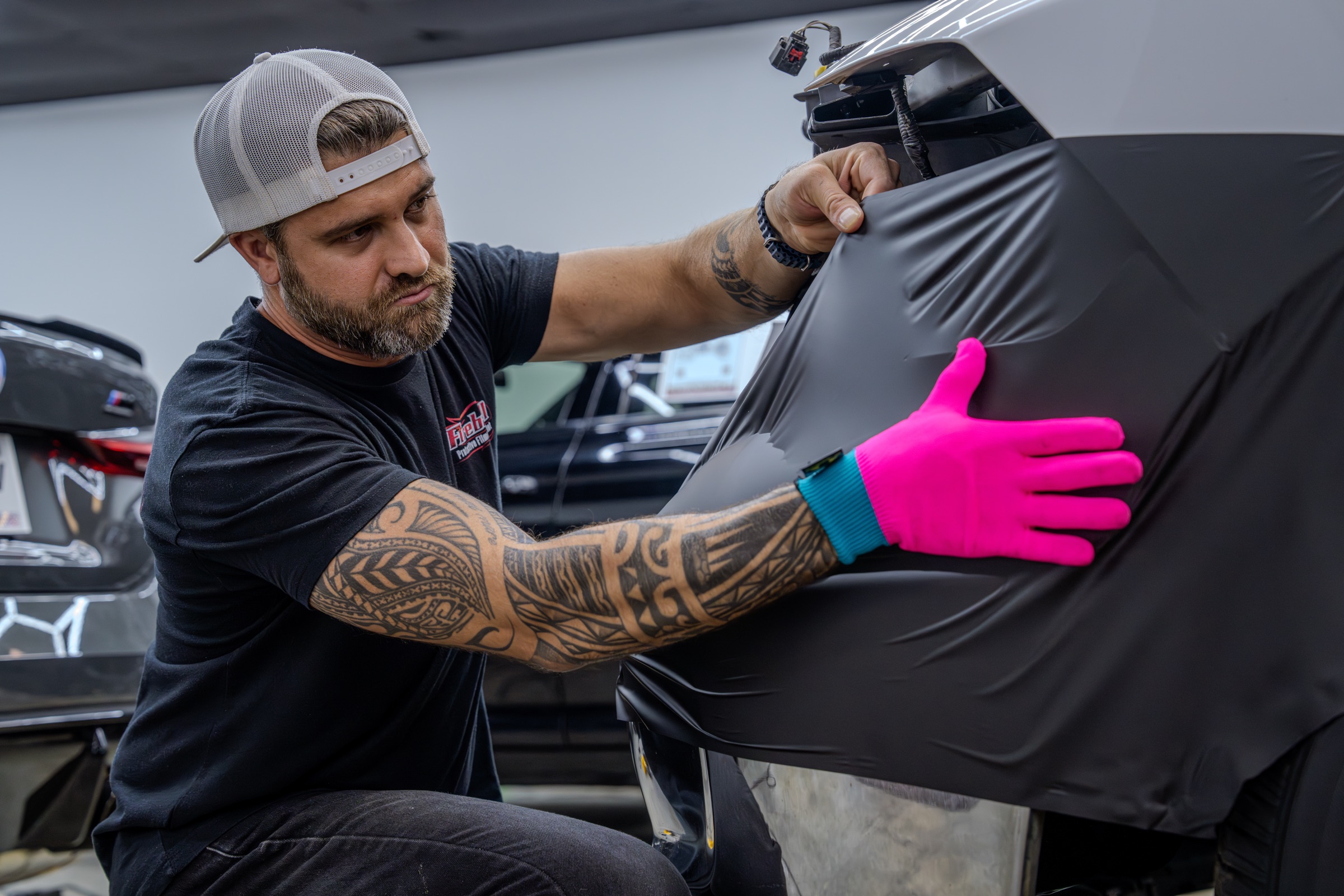 PPF installer at work — professional automotive photography